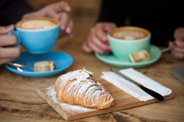 istock Coffee Shop Man and Woman Having a Coffee 674007340