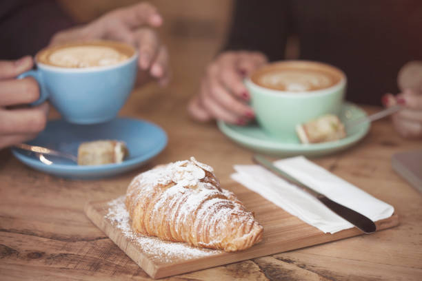 istock Coffee Shop Man and Woman Having a Coffee 674007382