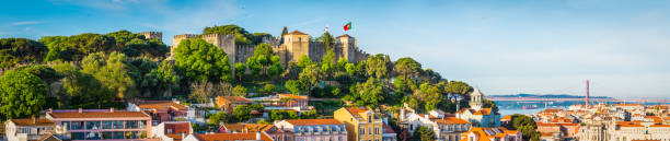 istock Lisbon panoramic view over city rooftops to Tagus River Portugal 674008040