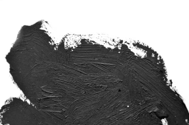 istock black brush strokes oil paints on white paper 674017270