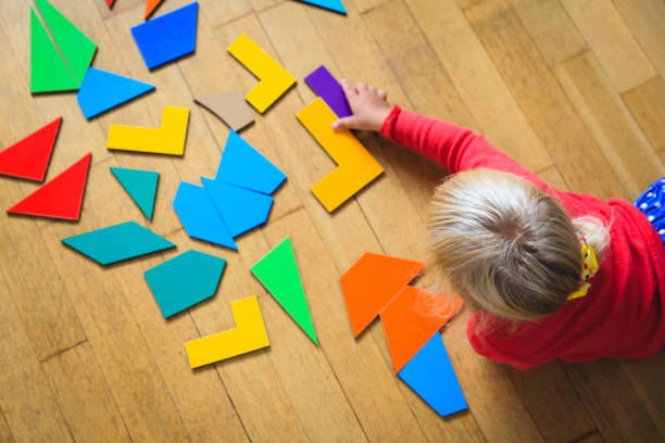 istock little girl playing with puzzle, early education 674024432