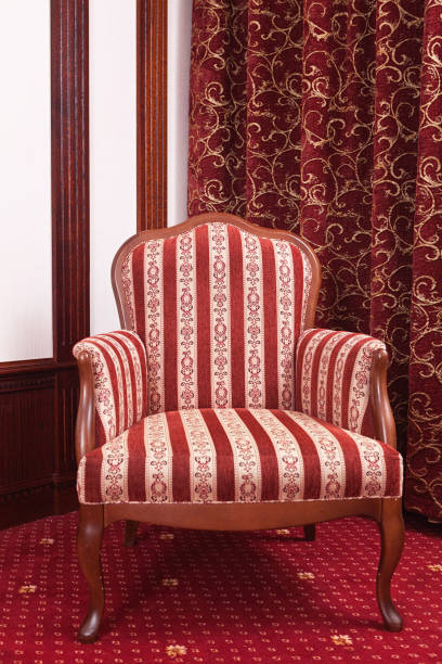 istock Antique armchair on retro style interior background 674035276
