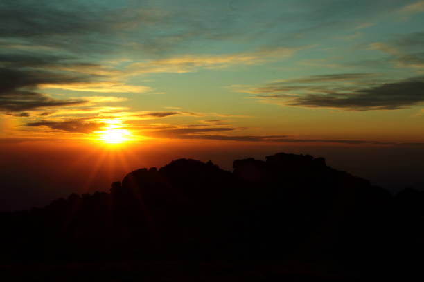 istock Suntes at top mountain 674035980