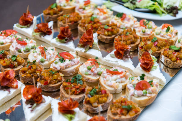 istock Colorful canape with vegetables and sausage on a slate plate 674064476