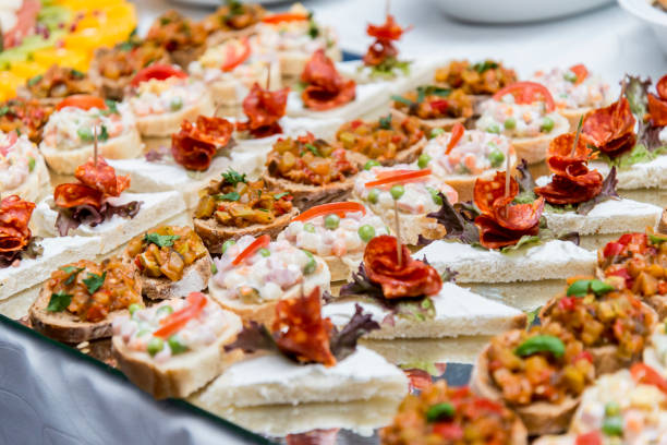 istock Colorful canape with vegetables and sausage on a slate plate 674064510
