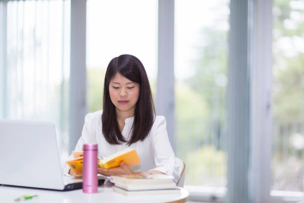 istock Japanese Girl Studying 674076344