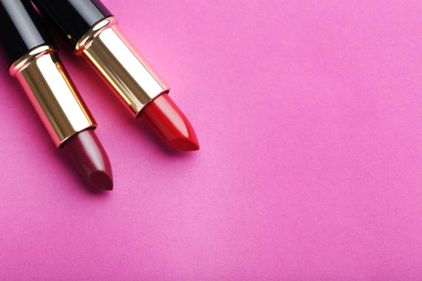 istock Colorful lipsticks on a pink background 674085466
