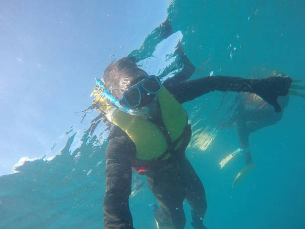 istock Scuba Diver Underwater taking a selfie in Whitsundays, Australia 674088054