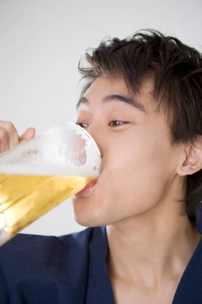 istock Yukata men drink beer 674091056