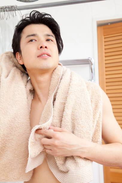istock Wipe the body with a towel man 674091202