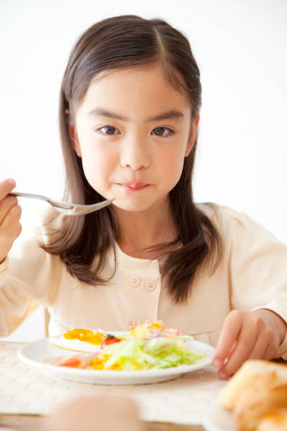 istock Girls eat breakfast 674096626