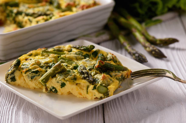 istock Fritata with asparagus on wooden background. 674096818