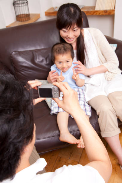 istock His father to shoot with a digital camera family 674097308