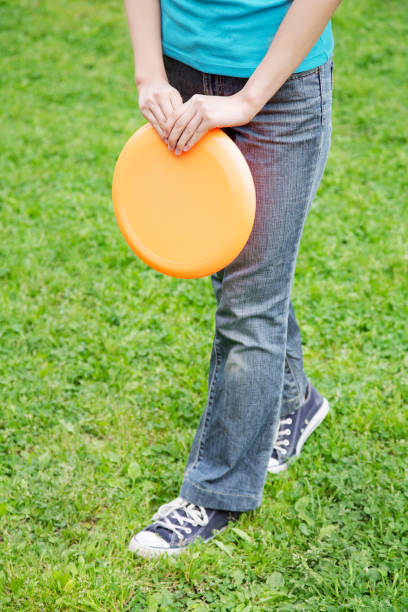 istock Woman with a frisbee 674098710