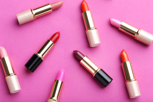 istock Colorful lipsticks on a pink background 674098840