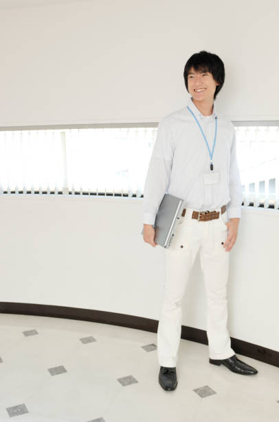 istock Businessmen have a laptop computer, smiling 674102638