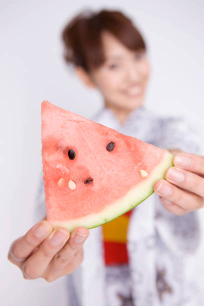 istock Watermelon eating yukata girls 674102848