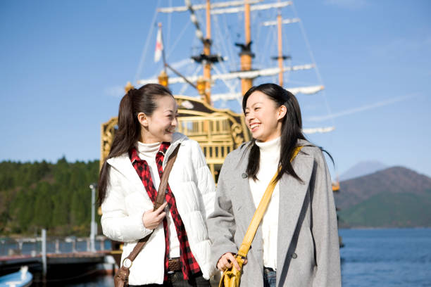 istock ASHI, two women walking in the Lake 674108722