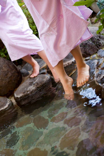 istock Two women soak feet in the bath 674109414