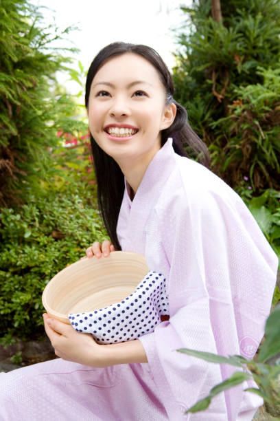 istock Yukata woman with bucket 674109584