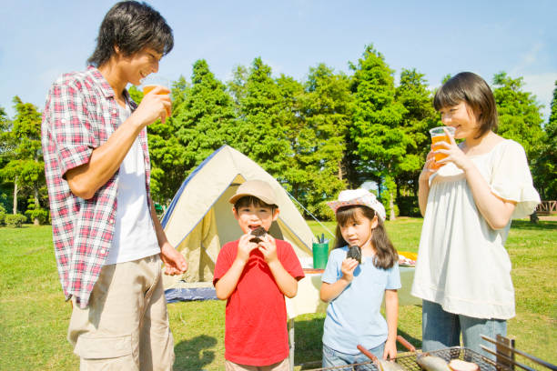 istock Families enjoy the BBQ 674114140