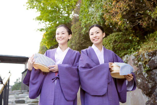 istock Two women walking with Oke yukata 674114314
