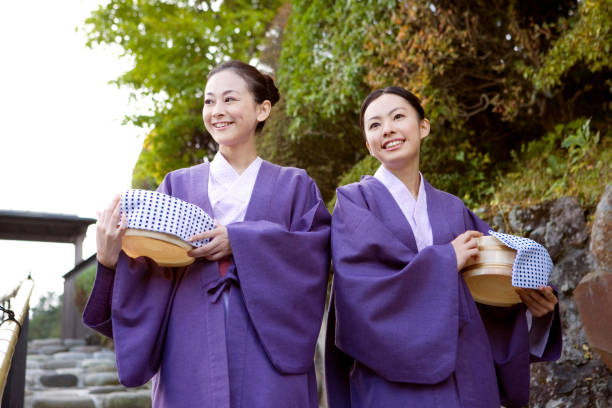 istock Two women walking with Oke yukata 674114322