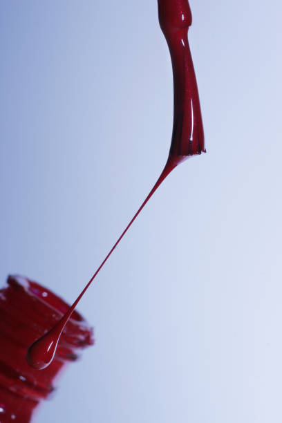 istock The image of a brush with a red paint 674122726