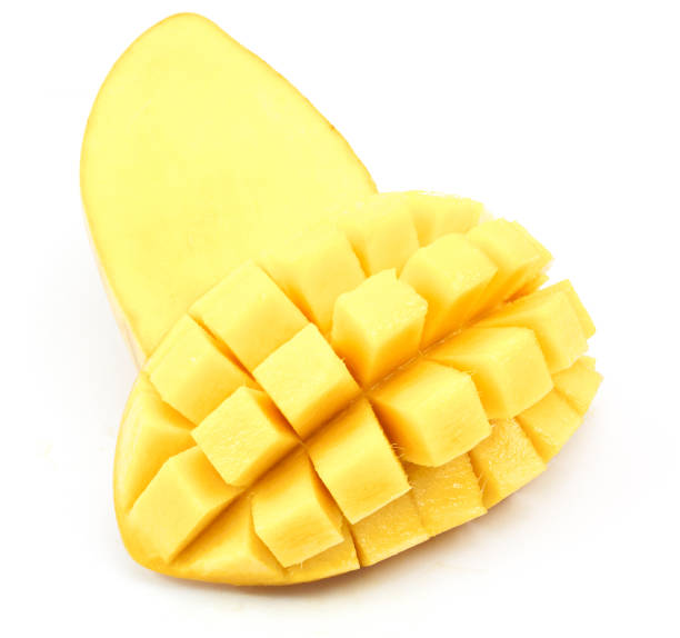 istock mango slice cut to cubes close up isolated on white background 674123334