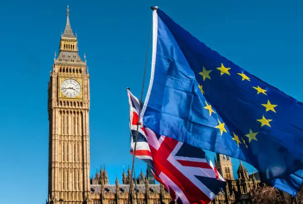 Photo of European Union flag in front of Big Ben, Brexit EU