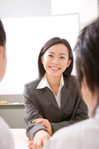 istock Female teacher teaches elementary school 674124442