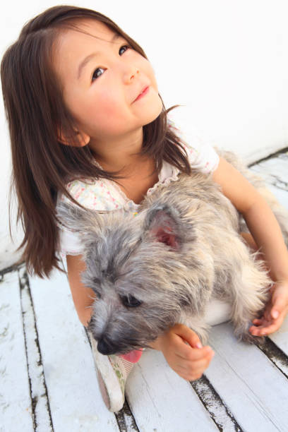 istock Girl and dog 674138324