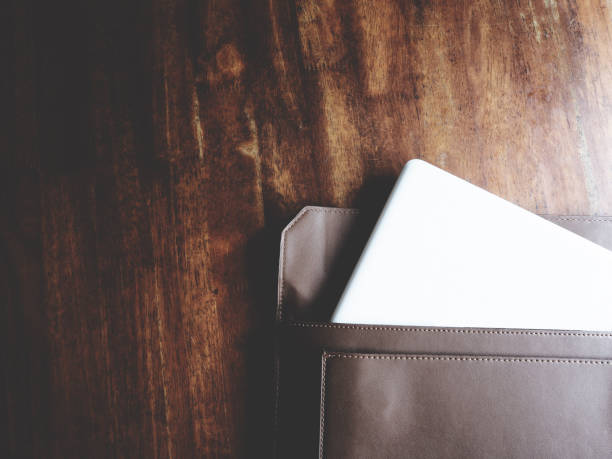 istock this is laptop on wooden table, minimal style, soft tone 674138658