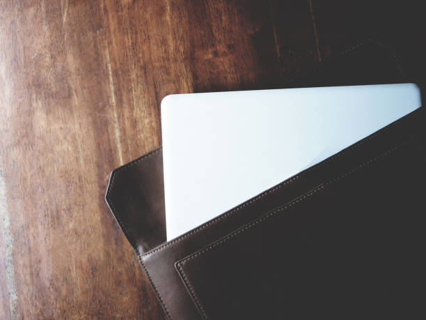 istock this is laptop on wooden table, minimal style, soft tone 674138684