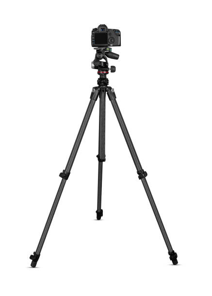 Camera on tripod Camera on tripod isolated on white digital camera photos stock pictures, royalty-free photos & images