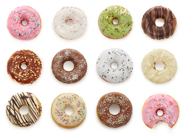 Donuts Delicious donuts isolated on white donut stock pictures, royalty-free photos & images