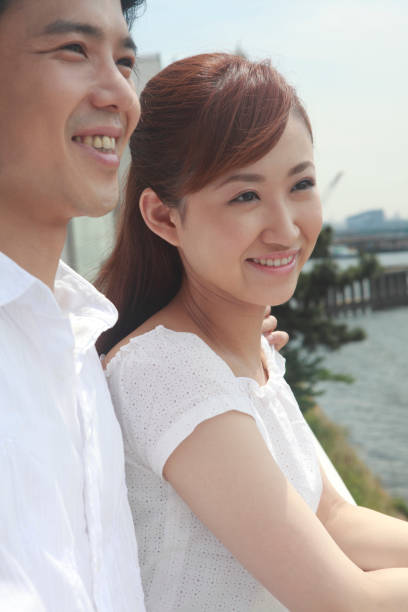 istock Couple looking out on the terrace 674140480