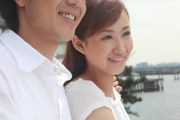 istock Couple looking out on the terrace 674140490