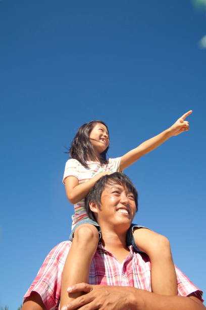 istock Father daughter to hold on shoulder 674146430