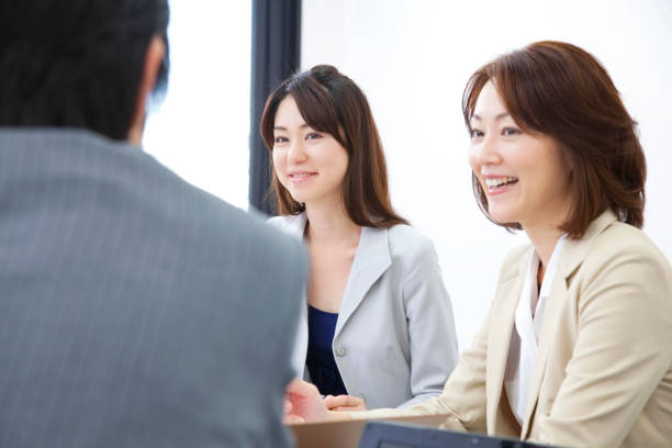 istock OL during a meeting with businessmen 674153320
