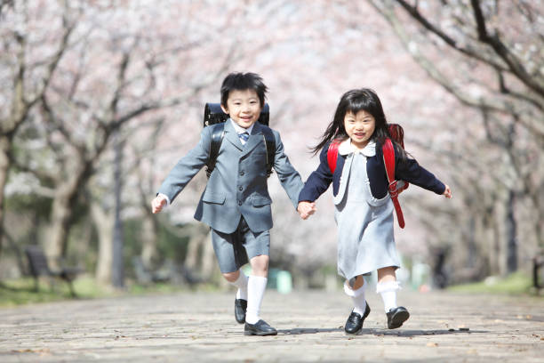istock Cherry elementary school men and women through the trees 674153868