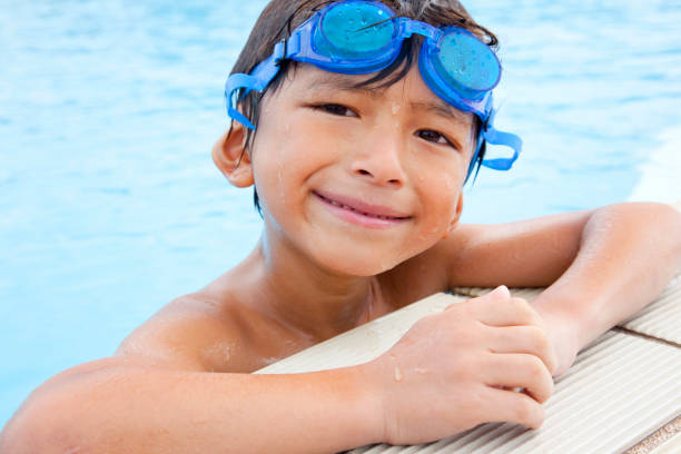 istock Smile in the pool boy 674163448