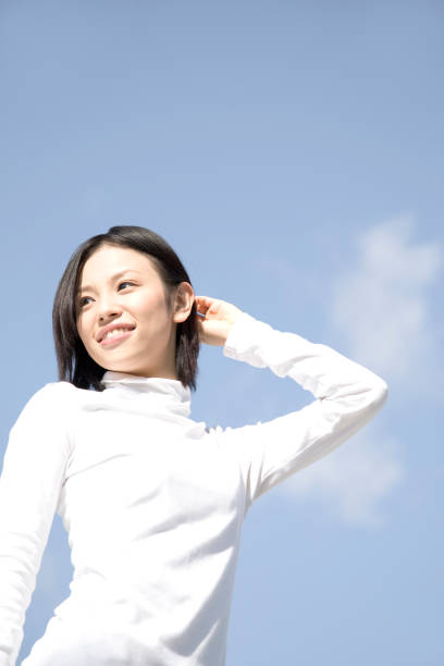 istock Woman with blue sky 674164960
