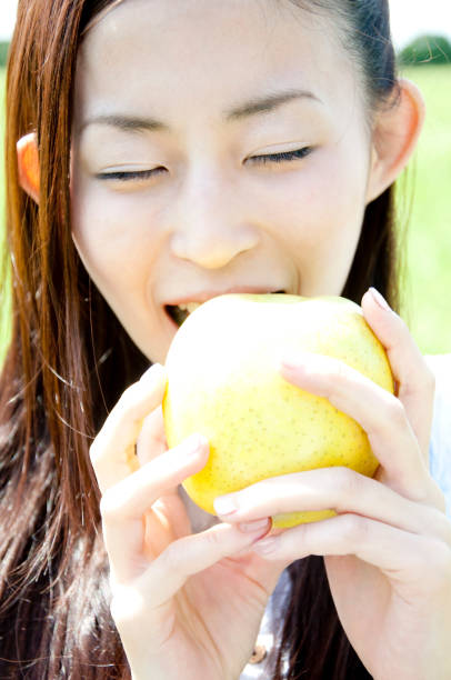 istock Ladies Munch an Apple blue 674167248