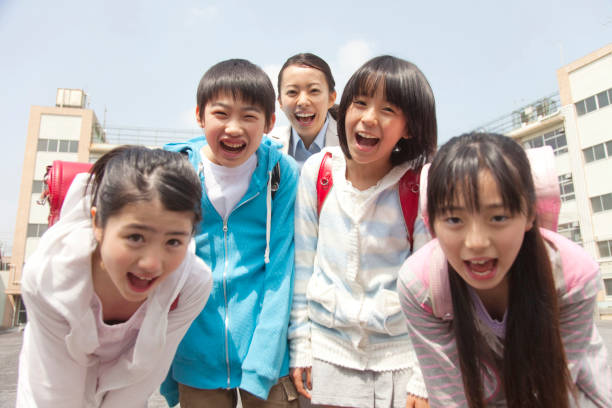 istock Smiley elementary school four female teachers 674170446