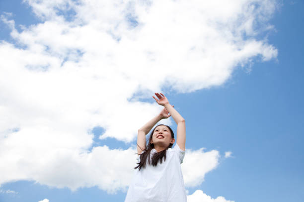 istock The growth under the sky woman 674170480