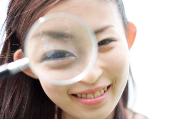 istock Women seen through a magnifying glass 674170536