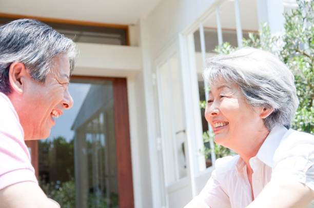 istock Senior couple talking in the garden 674170894
