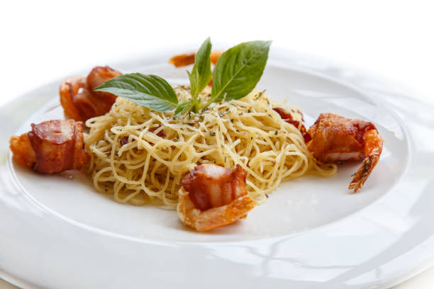 Homemade angel hair pasta with prawn and bacon