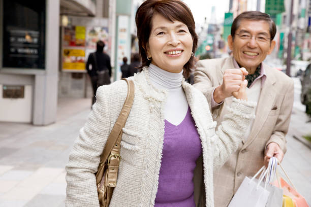 istock Married couple enjoy shopping 674177822